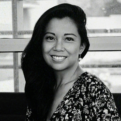 A black and white photograph of Love.Life medical team member, lead functional physician, Dr. Jaclyn Tolentino. 